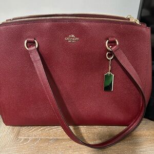 Coach Bag much like The Carter Carry All Bag